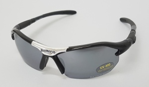 OCHELARI SHIMANO NOVA SHINY BLACK CU FATA SILVER CHROME (CU LOGO SHIMANO NEGRU)