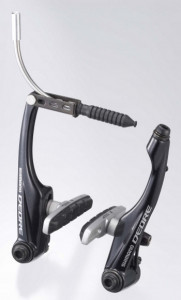 FRANA V-BRAKE SHIMANO DEORE BR-M590-L FATA X-TYPE (SAIBA SUBTIRE IN EXTERIOR) SABOTI S70T SURUBURI DE FIXARE 25.0MM NEGRU VRAC
