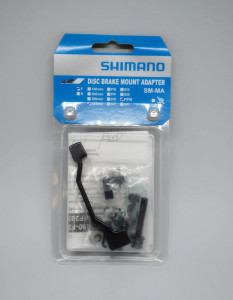 ADAPTOR MONTAJ PT. ETRIER FRANA PE DISC SHIMANO SM-MA-F203P/PM SURUBURI LING X 1 SCURT X 1 STOP RING X 1 SAIBA-A X 2 SAIBA-B X 2 AMBALAT IND.