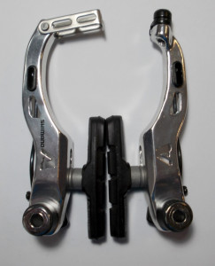FRANA V-BRAKE SHIMANO ALIVIO BR-MC18 SPATE SURUBURI 25.0MM X-TYPE (SAIBA SUBTIRE IN EXTERIOR) SABOTI M70T3 FARA GHIDAJ CABLU VRAC