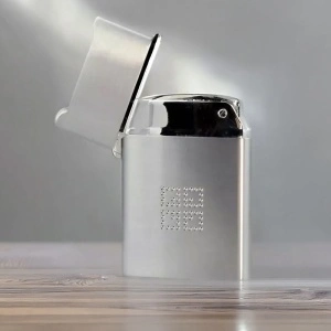 Brichetă de lux Givenchy 3307, argintie cu logo perforat, aprindere clasică cu piatră